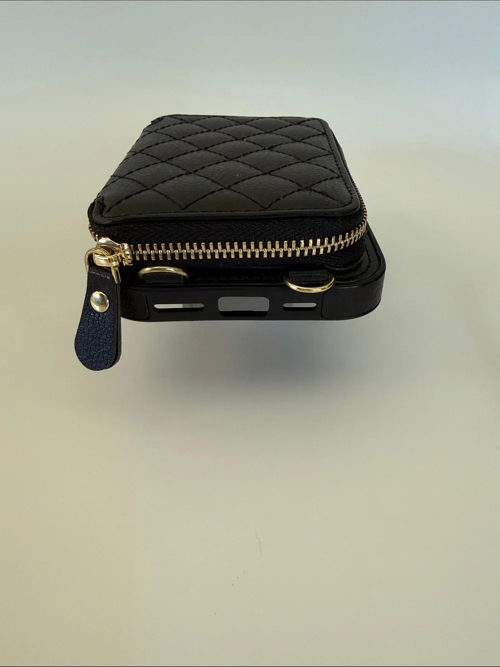 Black Quilted Wallet Phone Case with adjustable strap. iPhone 16 ProMax
